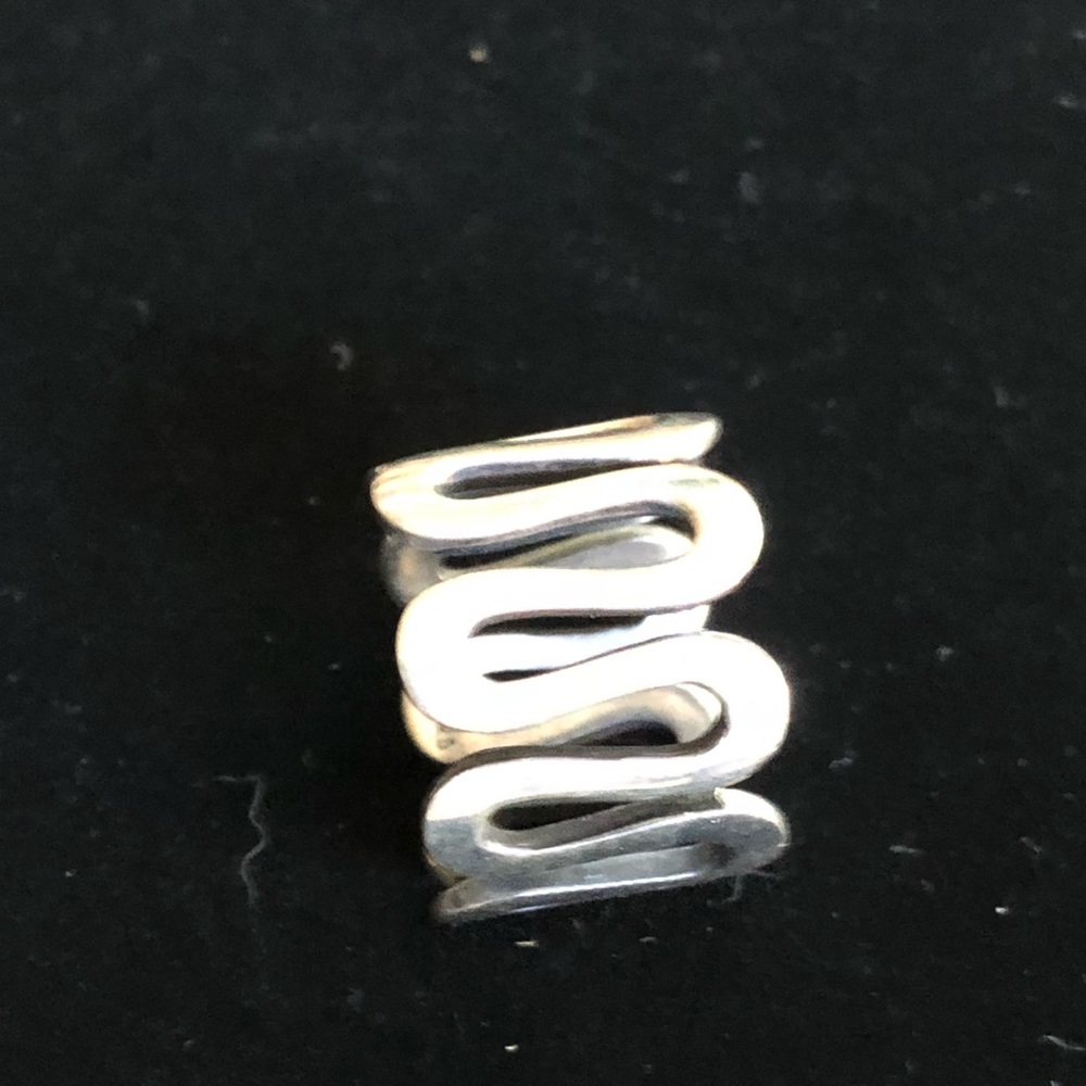 Curvilinear modernist sterling silver ring.